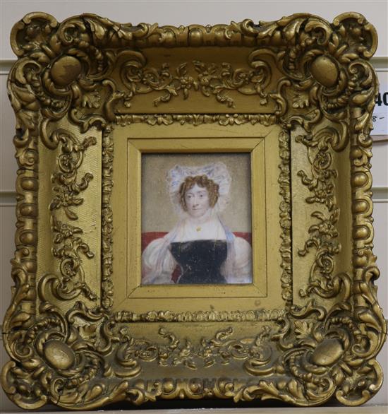 19th century English School, oil on ivory, miniature portrait of a lady wearing a black dress, 10 x 8cm